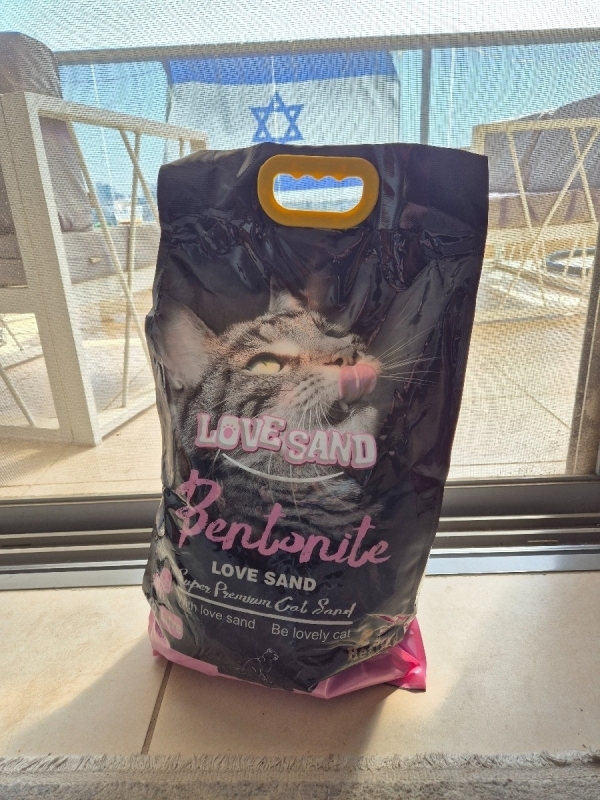 חול מתגבש בריח טלק לחתול